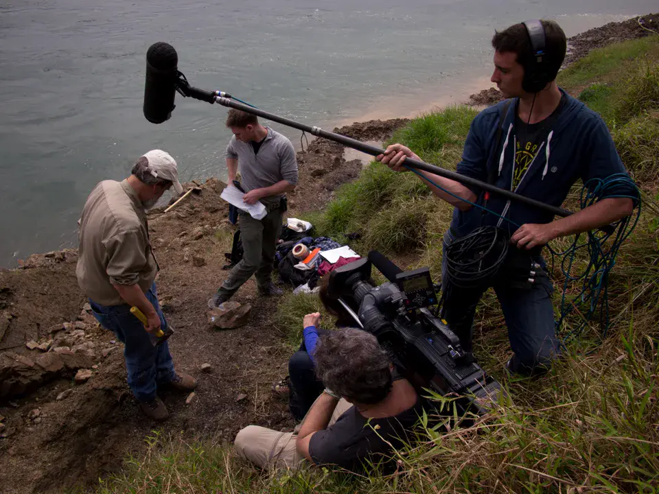 Field documentary crew filming on location in China